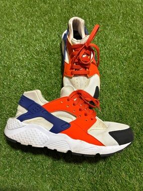 Kids Orange and White Nike huarache’s Athletic Sneakers